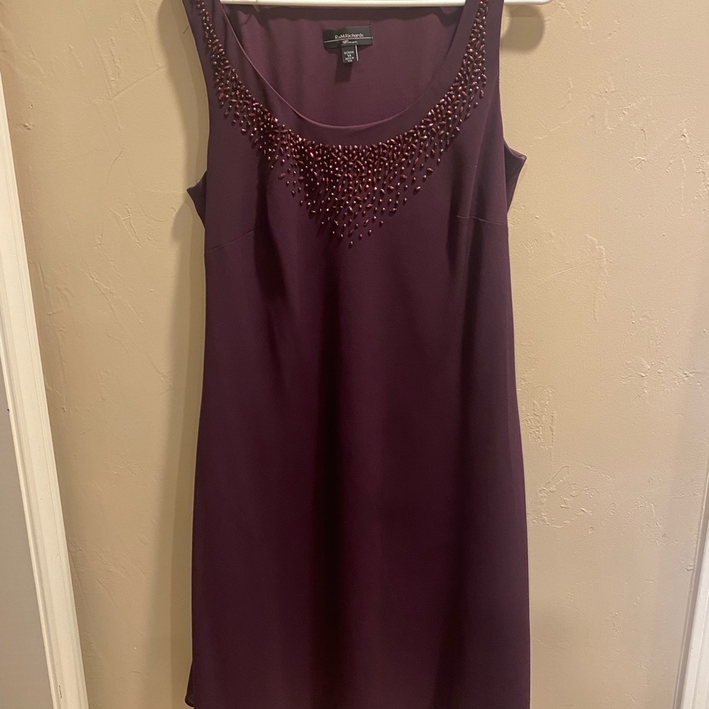 Classy and glitzy two-piece dress and jacket set.